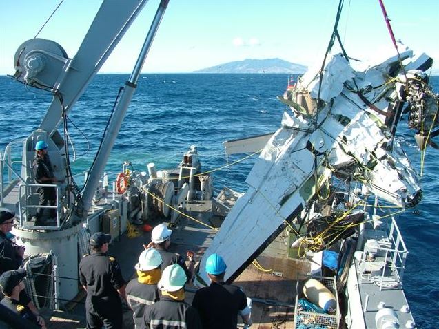 Plane wreckage is brought on board the HMNZS Manawanui on Sunday - Image Police/ Navy