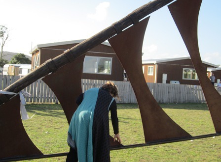 A guest at the opening experiences the sculpture up close.