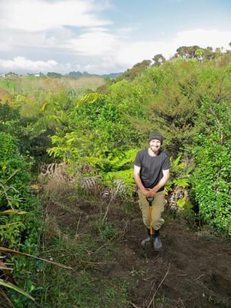 After photo - Niall Darwin, better known for his PiwiWiwi Campervans, was one of the volunteers who made a start on the work on Sunday and looked well pleased with the area cleared. - Image supplied