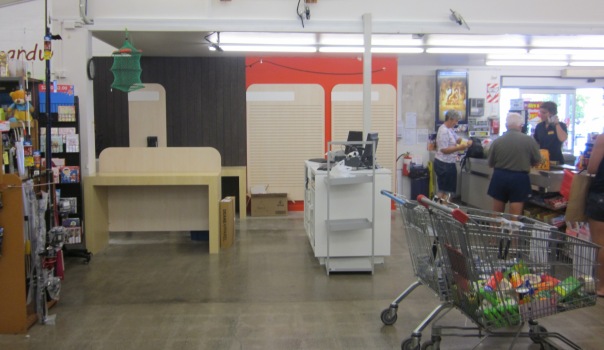 Postal counter being finished on Saturday 15th- between fishing rods and checkouts