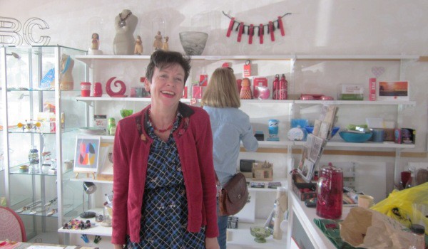 Angela busy in her shop on Saturday after Friday night's opening party.