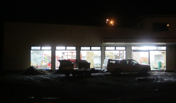 Tradespeople busy at night on 8th May completing the new Four Square