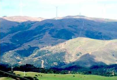 Powerline runs up to Wind Farm on plateau. Image John Lawson