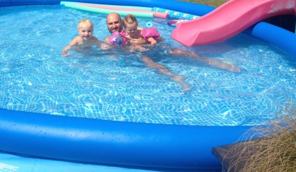 Jacob Nooyen has kept his inflatable pool water clean all summer for children, Leo and Maya to enjoy. Image supplied