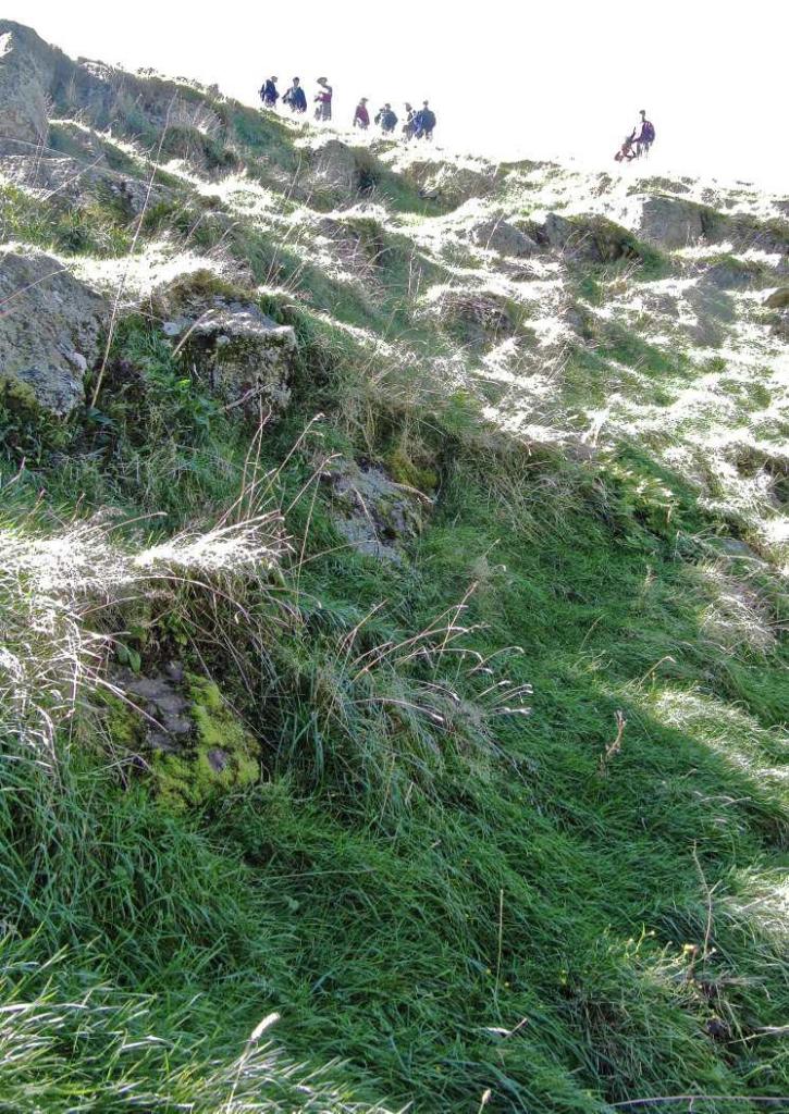 Ramblers stand above deep sinkhole - Image John Lawson