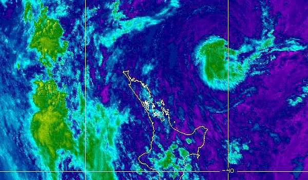 satellite map of the North Island showing a low off to North Island to the north west and the trough of thundery weather to the west coming in from the Tasman Sea. NOAA Satellite map at 9.00am on 27th. Navy blue is cloud free, warm surface temperatures. Cyan is weak, warm cloud tops, low altitude. Brown is intense, cold cloud tops, high altitude.