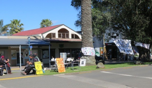 Supporters of the Rally for Democracy with their placards in Bow St