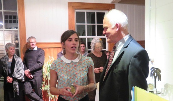 Sara Guix receives her award from Richard Gemmell