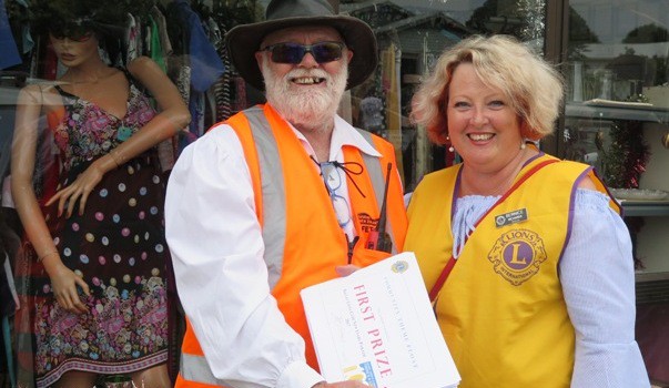 Raglan Lions Club members Bob and Bernice with the prize winner certificates