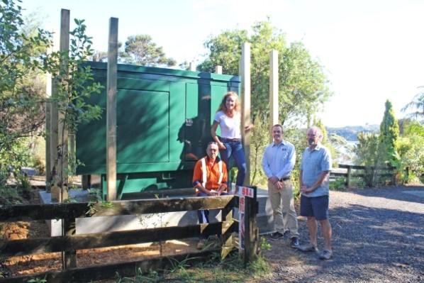 From left, Reticulation Serviceman Roger Smith, Raglan Ward Councillor Lisa Thomson, Waters Operations Team Leader Robert Ball and local resident Dermot Murtagh in front of the new Greenslade Road generator.