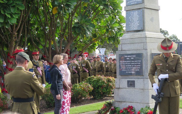 Lesley Clough and Jillian Lankshear lay the Raglan Community Arts Council wreath. Image Richard Gallagher