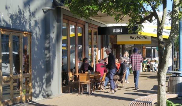 Guests enjoying the sun and a coffee at ISOBAR on Saturday 11th