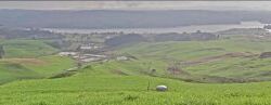 View from Hills' farm on Te Hutewai Rd – where the radio masts are, only 160m above Raglan but good views across harbour and coast 141016viewfromhillsfarm