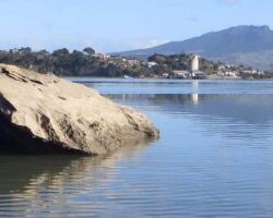 View across harbour of Raglan and Karioi from vicinity of Motukokako Point 161201harbourboatkarioi